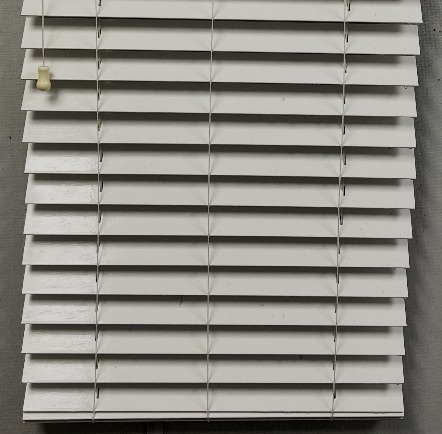 Clean white venetian blinds after Capital Blind cleaning